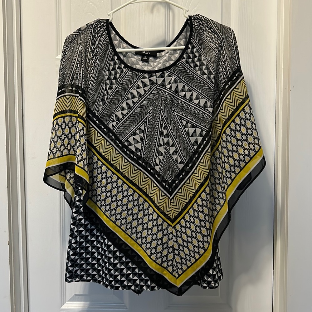 Sheer poncho with tank underneath